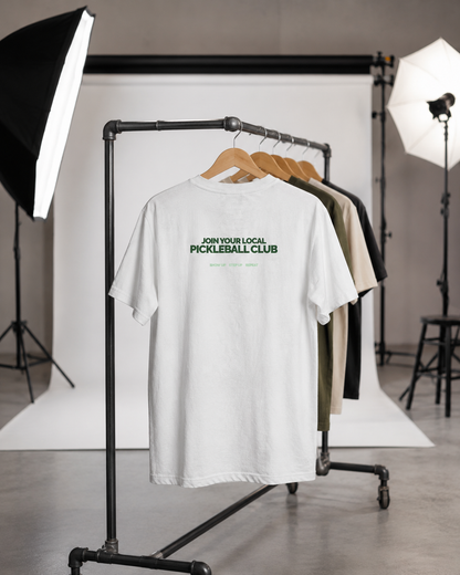Pickleball club t-shirt on clothing rack in studio