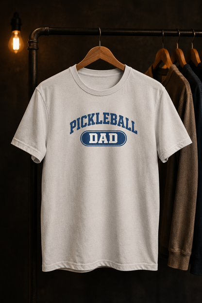 Pickleball Dad shirt on clothing rack in moody studio